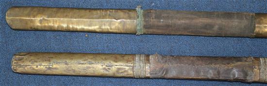 A Tibetan Dao or sword, largest 32.5in. incl. scabbard